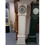 An early twentieth century painted continental longcase clock with circular silvered dial,