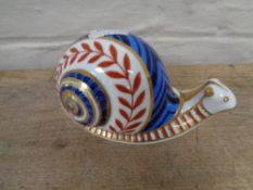 A Royal Crown Derby snail paperweight with stopper.