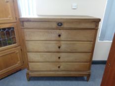 A nineteenth century oak five drawer chest