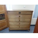 A nineteenth century oak five drawer chest