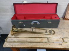 A Regent slide trombone in fitted carry case.