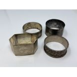 Four assorted silver napkin rings CONDITION REPORT: 91.