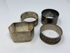 Four assorted silver napkin rings CONDITION REPORT: 91.
