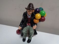 A Royal Doulton figure, The Old Balloon Seller, HN 1954.