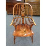An elm Windsor style armchair