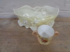 A hand painted Royal Worcester blush ivory twin-handled cup, height 3.