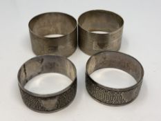 Two pairs of silver napkin rings CONDITION REPORT: 70.