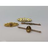 Four 9ct gold brooches, one set with ruby and diamond CONDITION REPORT: 11.