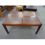 A mid century Danish rectangular coffee table with four tiled inserts