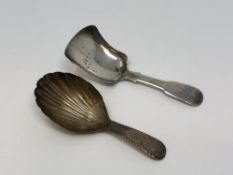 A Georgian silver caddy spoon and a Victorian example by George White (2)