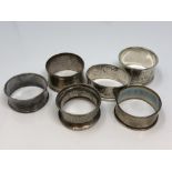 Six assorted silver napkin rings CONDITION REPORT: 72.