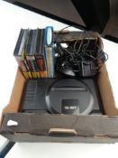 A box of Sega Mega Drive with controller and leads plus 3 games.