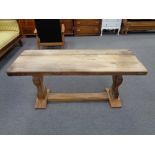 A twentieth century rustic oak refectory coffee table