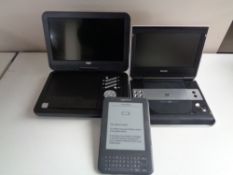 Two portable DVD players and an Amazon Kindle (no leads).