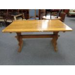 An oak refectory dining table