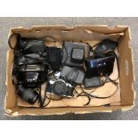A quantity of cameras and lenses including Canon AE-1,