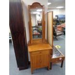 An early twentieth century stained pine washstand fitted with cupboard and drawer beneath