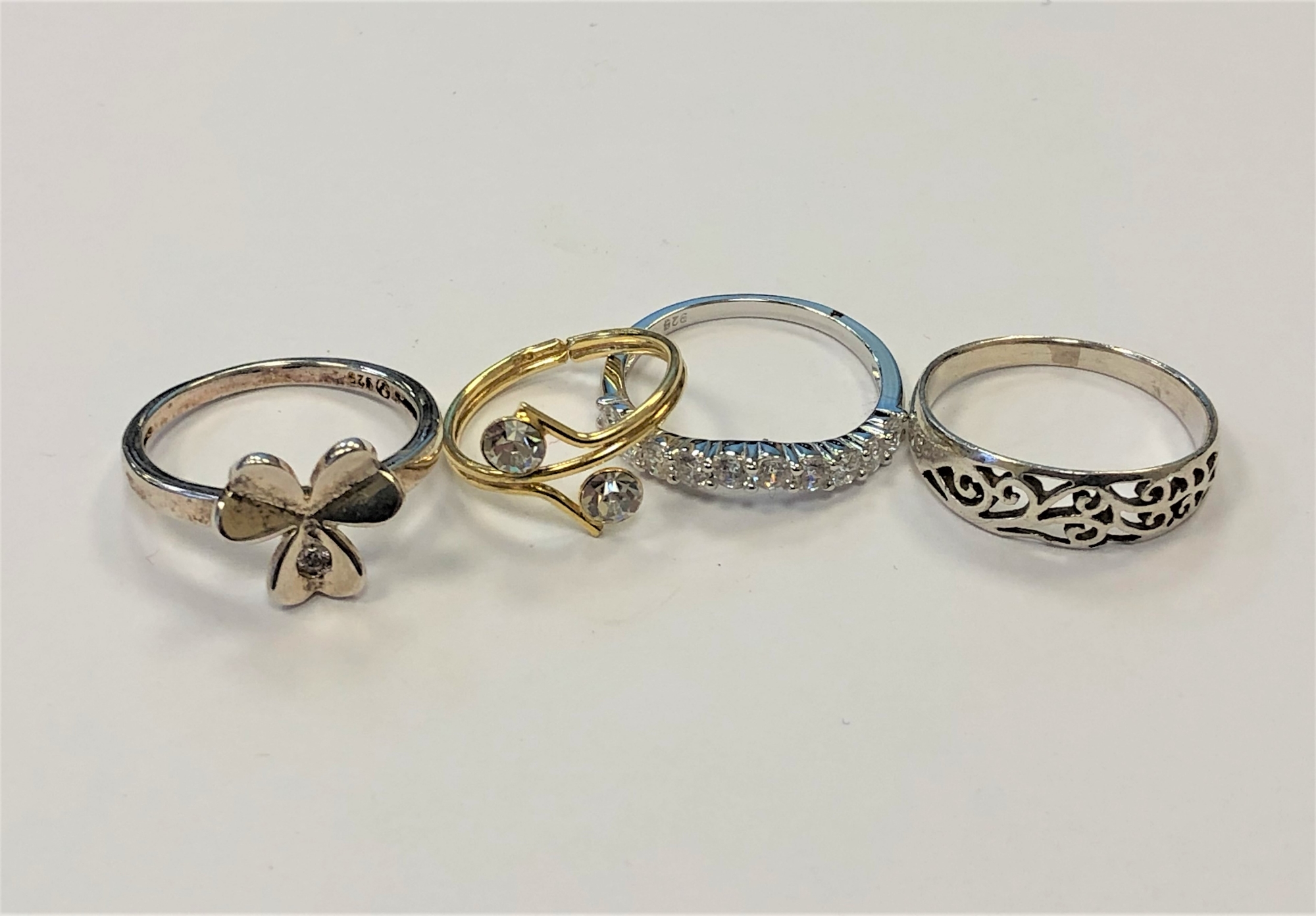 Four white metal dress rings - Image 2 of 2