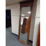 A large late nineteenth century continental walnut and ebonised hall mirror