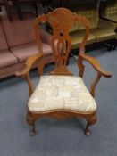 An antique oak carver armchair