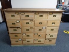 An Edwardian oak twenty drawer chest CONDITION REPORT: 136cm wide by 44cm deep by