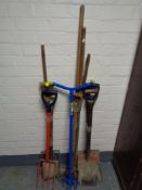 Three bundles of garden tools