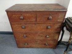 A Victorian pine five drawer chest