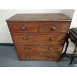 A Victorian pine five drawer chest