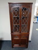 An Old Charm leaded glass door cabinet