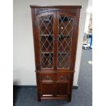 An Old Charm leaded glass door cabinet