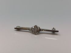 A white gold bar brooch set with old cut diamonds CONDITION REPORT: 2.