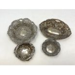 Four antique silver repousse dishes
