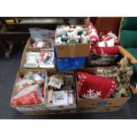 A pallet of Christmas decorations, soft toys, cushions, gift bags,