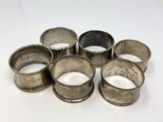 Six assorted silver napkin rings CONDITION REPORT: 90.
