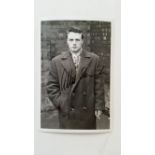 FOOTBALL, signed photo by Albert Scanlon, half-length in civilian clothes holding cigarette, 6 x