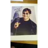 POP MUSIC, signed colour photo by Elton John, half-length singing into microphone, 8 x 10, EX