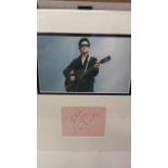 POP MUSIC, signed album page (4.25 x 3.25) by Roy Orbison, overmounted beneath colour photo, half-