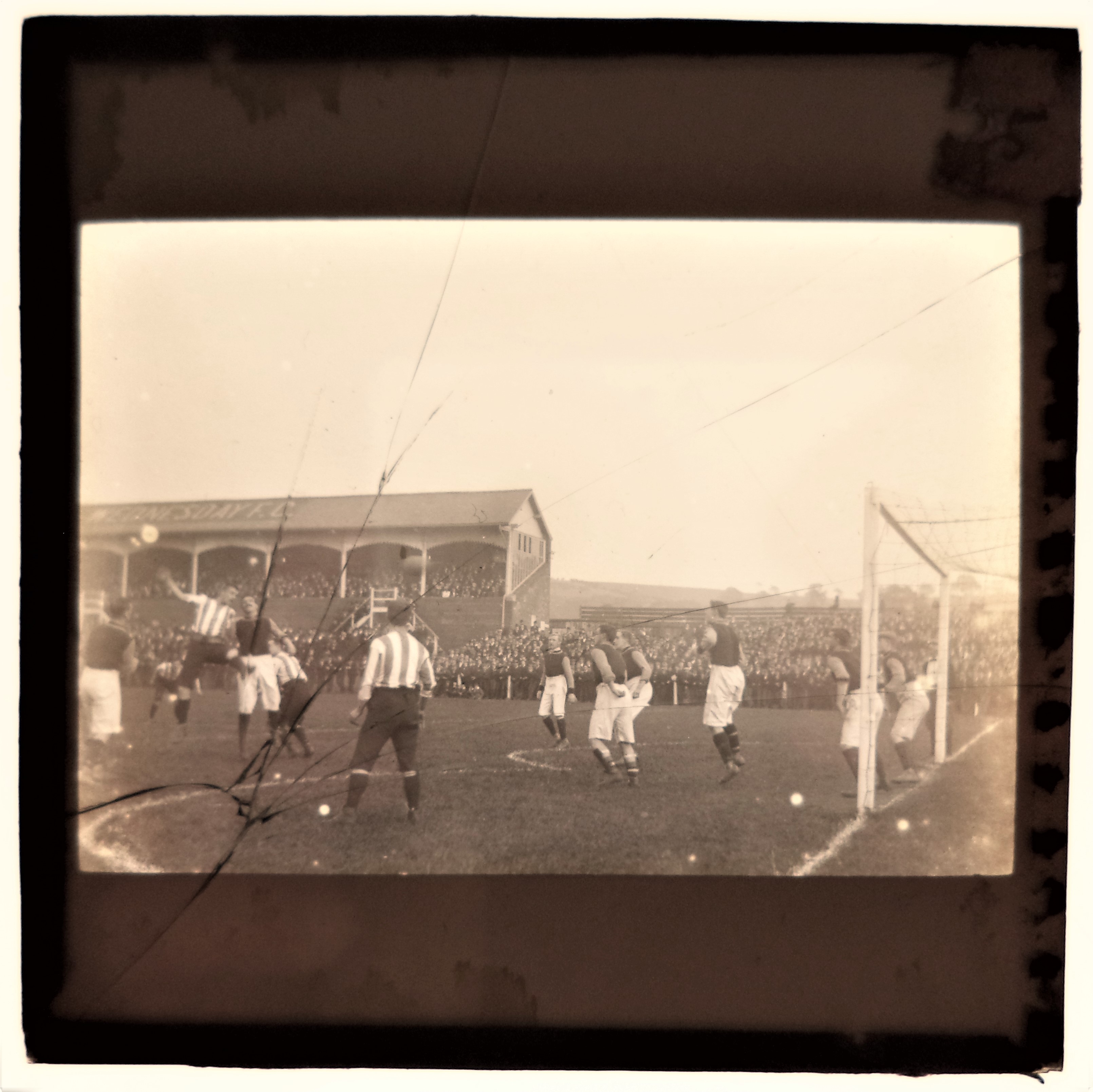 FOOTBALL, original glass positive (4.25 x 3.25), match action from the FA Cup (1st round replay),