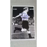 FOOTBALL, signed b/w photo by Wilf Mannion, showing him in action, inscribed, 10 x 6, VG