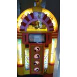 POP MUSIC, The Beatles, a full-size Beatles Yellow Submarine jukebox, with yellow plastic body,
