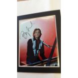 POP MUSIC, signed colour photo by Barry Manilow, half-length playingpiano on atage, 8 x 10,