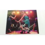 POP MUSIC, signed colour photo by Nicole Scherzinger, full-length performingon stage, 10 x 8, EX