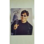 POP MUSIC, signed colour photo by Elton John, half-length singing into microphone, 8 x 10, EX