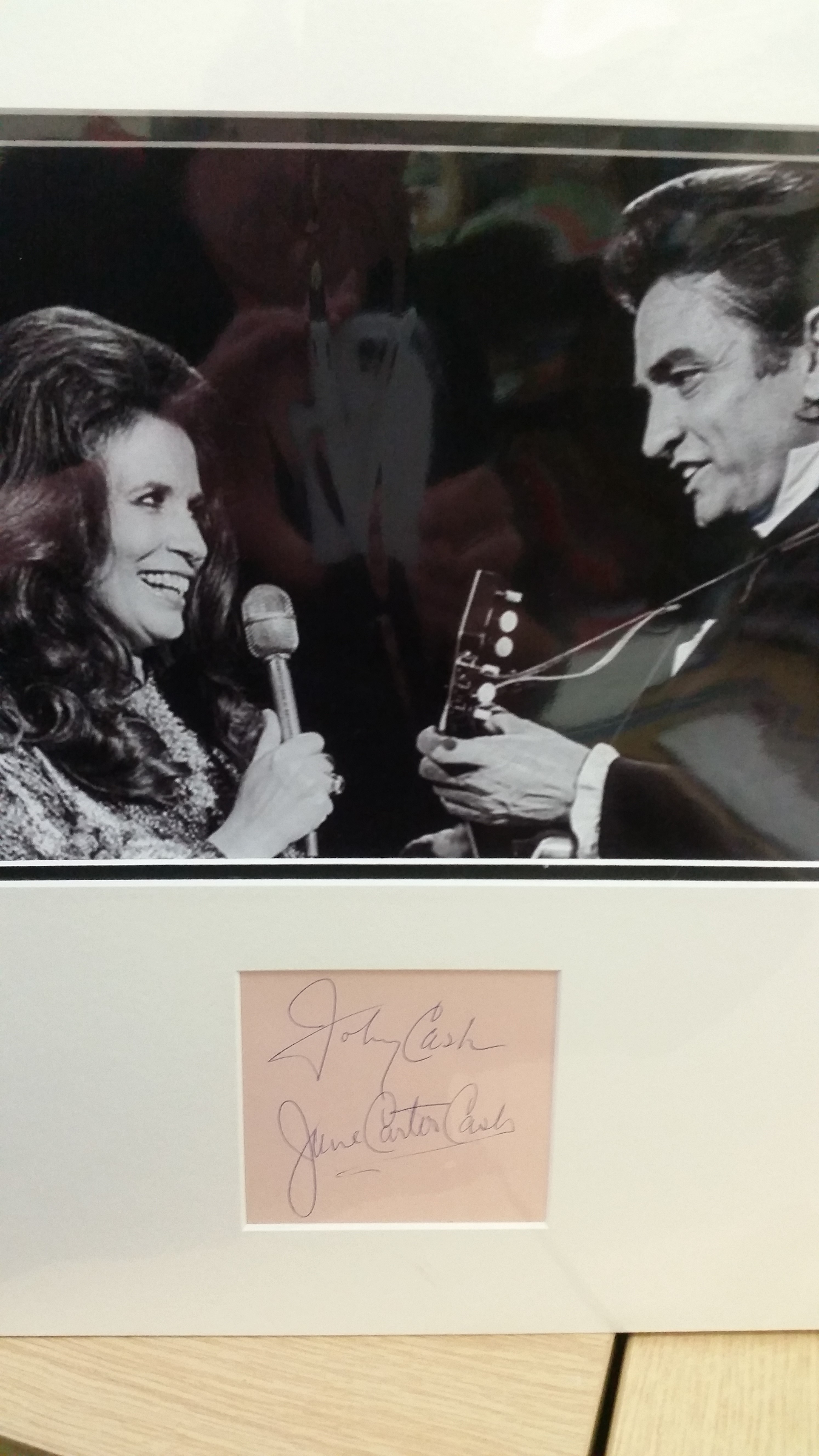 POP MUSIC, signed album page by Johnny Cash & June Carter Cash, 4 x 3.5, overmounted beneath photo