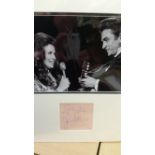 POP MUSIC, signed album page by Johnny Cash & June Carter Cash, 4 x 3.5, overmounted beneath photo