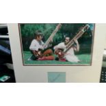 POP MUSIC, signed album page by Ravi Shankar, overmounted beneath colour photo of him playing