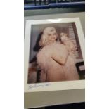 CINEMA, private colour photo of Jayne Mansfield, half-length holding small dog, 8 x 10, signed by