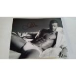 FOOTBALL, David Beckham, signed b/w photo showing him in laid back pose for underwear advert, 10 x