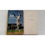 CRICKET, signed hardback edition of Pace Like Fire by Wes Hall, 1966, to flyleaf, dj (some fading to