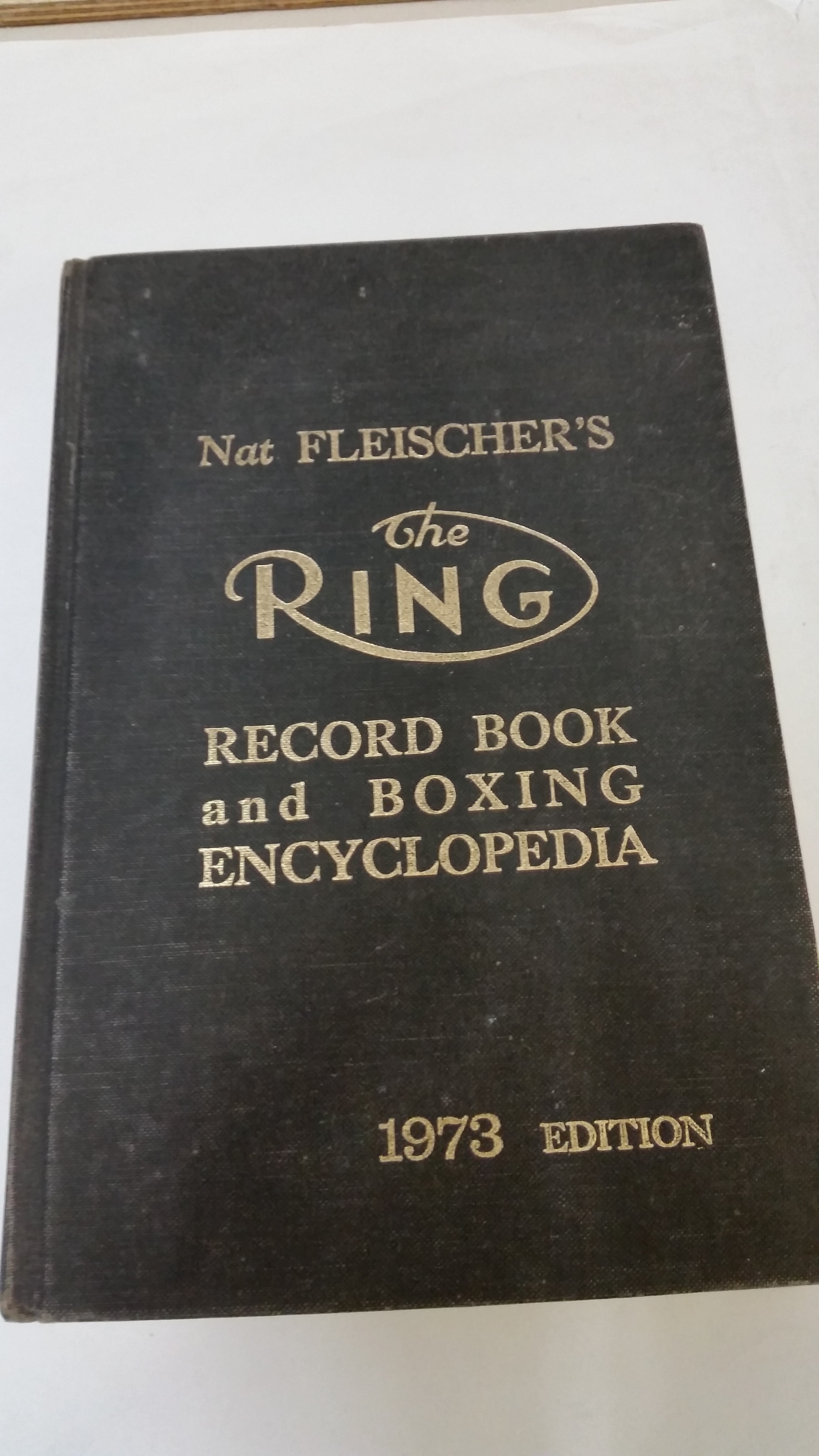 BOXING, hardback edition of The Ring by Nat Fleischer, 1973 Record book and Encyclopaedia, crease to